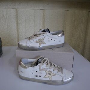BRAND NEW!! NEVER WORN!! Golden Goose White and Gold Star Sneakers.